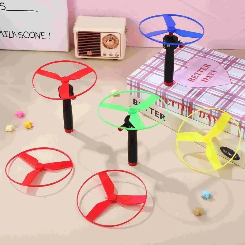 10 Piece Pull String Flying Propeller Toy Set