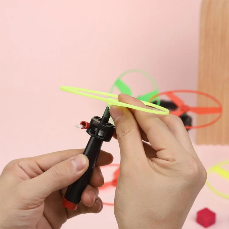 10 Piece Pull String Flying Propeller Toy Set